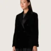 Giacca da donna doppiopetto in velluto nero con revers in raso nero