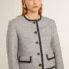 Giacca da donna in lana e seta grigia con rifiniture in pelle scamosciata nera