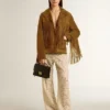 Giacca da donna in pelle scamosciata color tabacco con frange