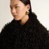 Giacca da donna in shearling nero
