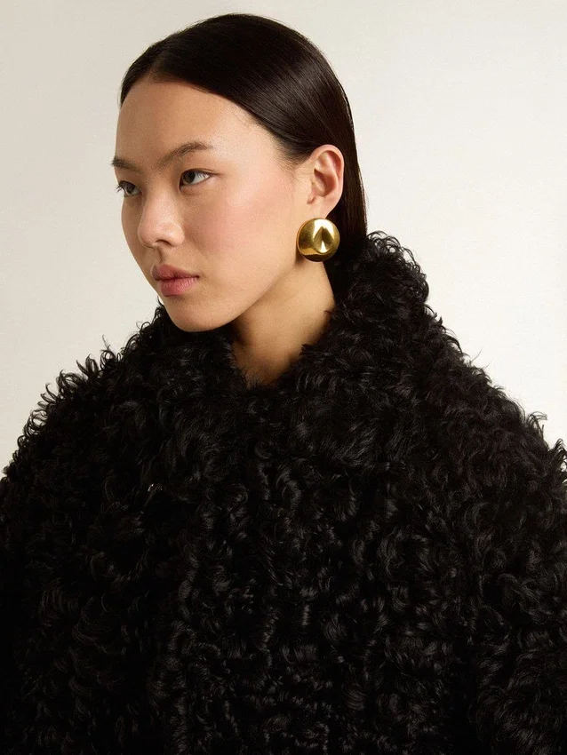 Giacca da donna in shearling nero
