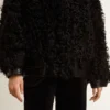 Giacca da donna in shearling nero
