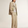 Giacca da donna monopetto beige a righe sottili con vestibilità oversize