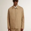 Giacca da uomo beige con ricami floreali e zip integrale