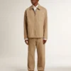 Giacca da uomo beige con ricami floreali e zip integrale