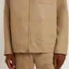 Giacca da uomo beige con ricami floreali e zip integrale