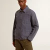 Giacca da uomo blu in denim di cotone con trattamento invecchiato