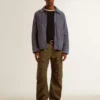 Giacca da uomo blu in denim di cotone con trattamento invecchiato