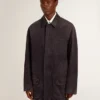 Giacca da uomo in denim con dettagli consumati e collo in pelle