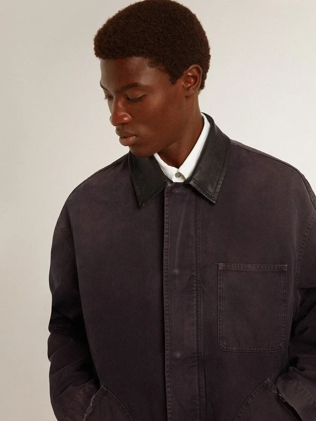 Giacca da uomo in denim con dettagli consumati e collo in pelle