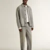 Giacca da uomo in denim grigio con borchie