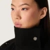 Giacca oversize da donna in twill di cotone nero con ricamo floreale in paillettes