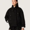 Giacca oversize da donna in twill di cotone nero con ricamo floreale in paillettes