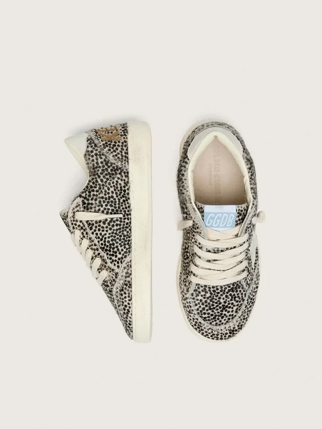 Giovane Ball Star in pelle di pony leopardata in bianco e nero con stella in pelle color crema