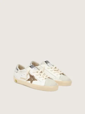 Giovane Super-Star con stella glitterata dorata e linguetta sul tallone in pelle metallizzata argento