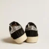 Hi Star da donna in pelle nera con linguetta sul tallone con glitter argento
