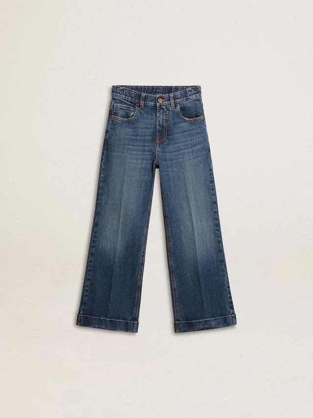 Jeans bootcut da bambina con lavaggio medio e ricami