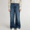 Jeans bootcut da bambina con lavaggio medio e ricami