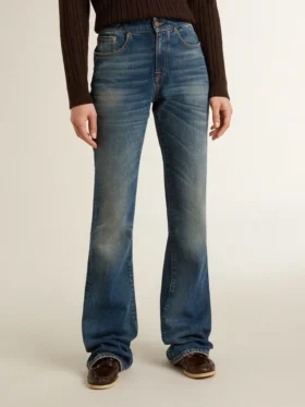 Jeans da donna a zampa con lavaggio vintage e dettagli metallici