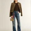 Jeans da donna a zampa con lavaggio vintage e dettagli metallici