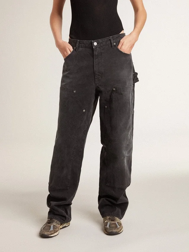 Jeans da donna in cotone nero con effetto consumato e toppe sul davanti