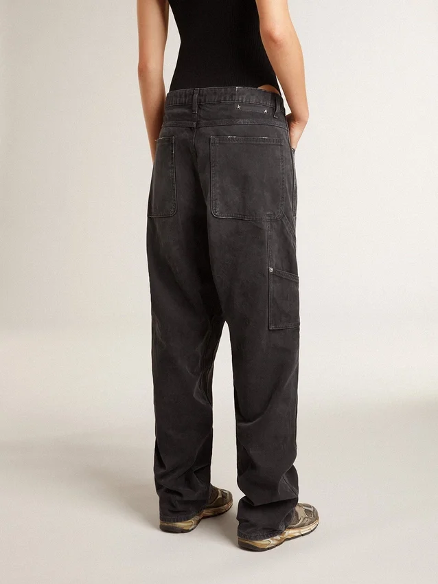 Jeans da donna in cotone nero con effetto consumato e toppe sul davanti