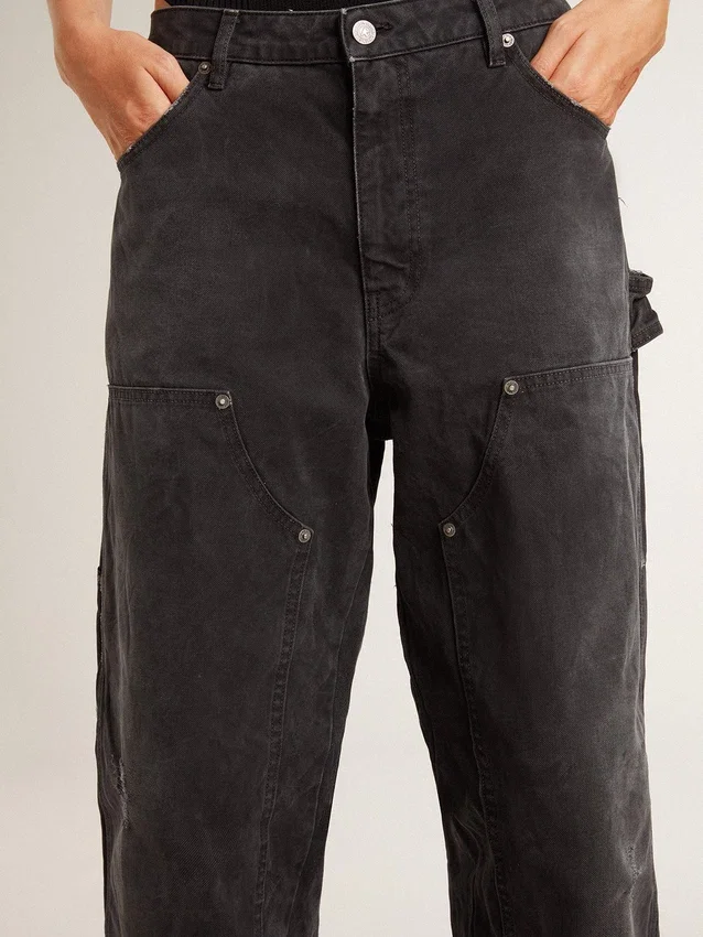 Jeans da donna in cotone nero con effetto consumato e toppe sul davanti