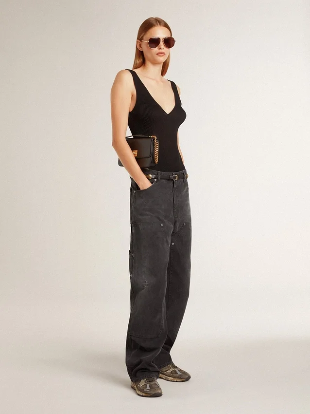 Jeans da donna in cotone nero con effetto consumato e toppe sul davanti