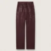 Jeans da donna in denim bordeaux con cristalli sfumati