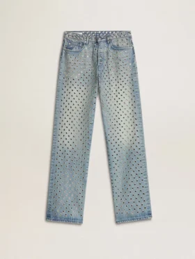 Jeans da donna lavati con occhielli su tutta la superficie