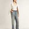 Jeans da donna lavati con occhielli su tutta la superficie