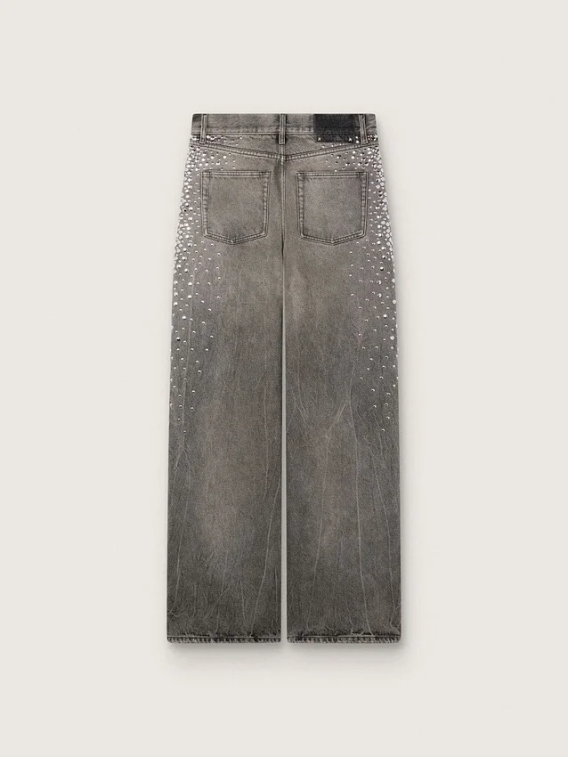 Jeans da donna modello boyfriend in denim grigio con borchie argentate effetto sfumato
