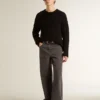 Jeans da uomo grigio scuro in denim con lavaggio a pieghe ritorte