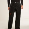Jeans da uomo neri dalla vestibilità ampia con cristalli su tutta la superficie e effetto sfumato