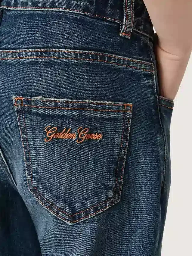 Jeans per bambini con orlo grezzo e ricamo