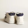 June Junior in nappa con stella e linguetta sul tallone in pelle scamosciata blu scuro