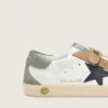 Junior Old School con stella in pelle nera e inserti in pelle scamosciata beige e verde