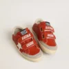 Junior Old School in nappa arancione con stella bianca e linguetta sul tallone in pelle color crema