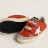 Junior Old School in nappa arancione con stella bianca e linguetta sul tallone in pelle color crema
