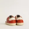 Junior Old School in nappa arancione con stella bianca e linguetta sul tallone in pelle color crema