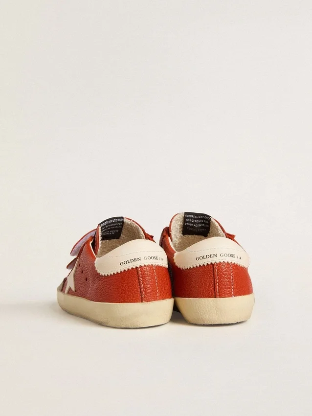 Junior Old School in nappa arancione con stella bianca e linguetta sul tallone in pelle color crema