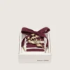 Lacci CNY Pellami in lana bordeaux con spilla a forma di fiore dorata