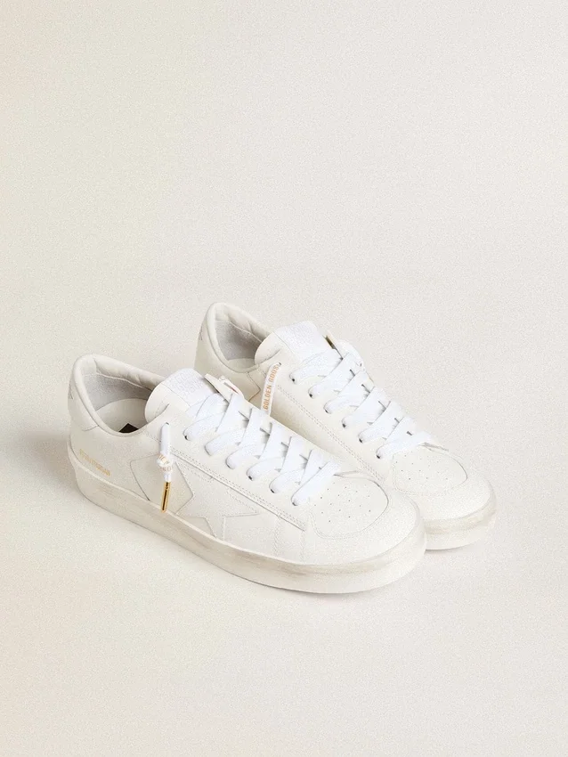 Lacci in cotone bianco con logo dorato a contrasto