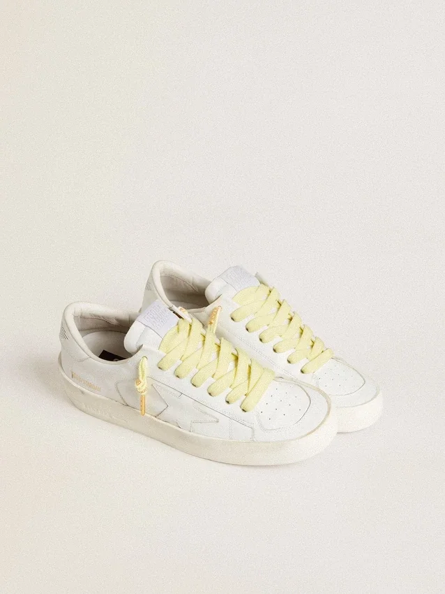 Lacci in cotone giallo con logo a contrasto color oro