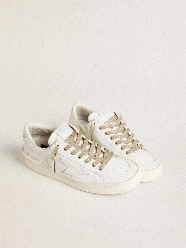 Lacci in lurex color oro con logo bianco a contrasto