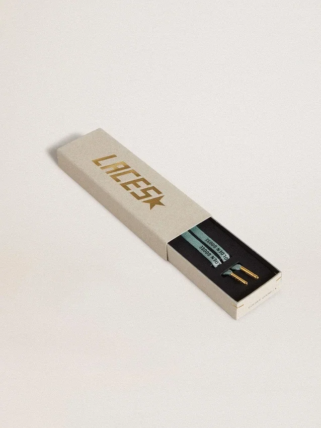 Lacci in lurex grigio con logo nero a contrasto