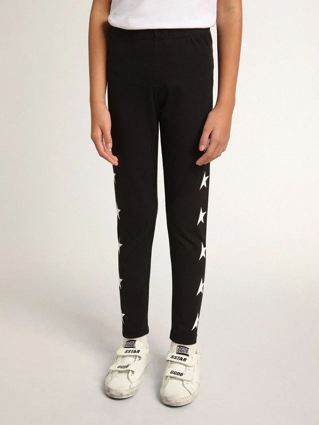 Leggings neri per bambine con stelle bianche sui lati