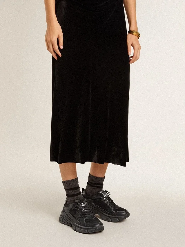 Lightstar da donna con tomaia in pelle nera e rete e stella nera