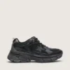 Lightstar da donna con tomaia in pelle nera e rete e stella nera