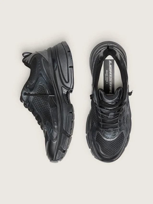 Lightstar da donna con tomaia in pelle nera e rete e stella nera